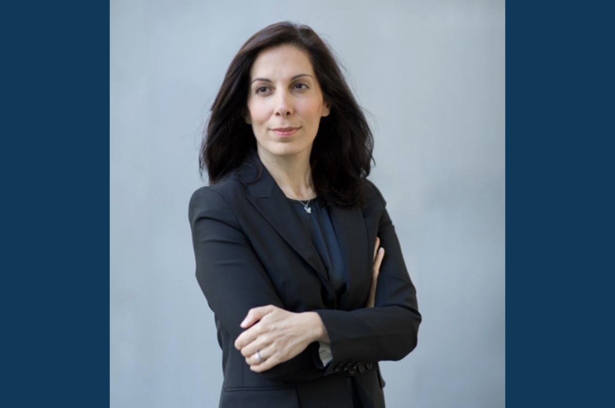 Woman standing with arms crossed